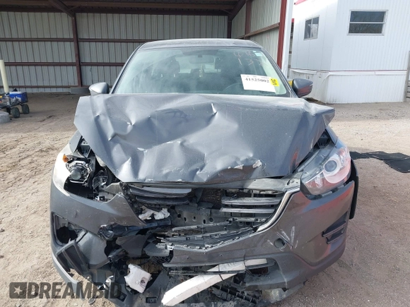 2016 Mazda CX-5 Sport with VIN JM3KE4BY0G0623365, listed as a IAAI auction lot 41525002 with 127,674 mi miles and . Bid and sale history available at carsss.com. Image 12.