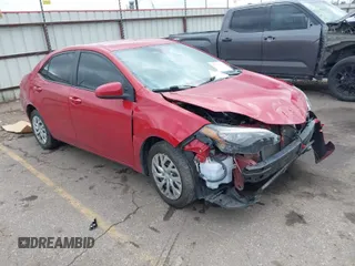 2019 Toyota Corolla L z VIN 5YFBURHEXKP915318, wystawiony jako IAAI lot #41711857 z przebiegiem 70 964 mil mil oraz . Historia ofert i sprzedaży dostępna na DreamBid. Obrazek 1.