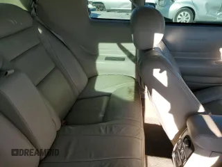 2000 Cadillac Eldorado z VIN 1G6EL12Y5YU176121, wystawiony jako Copart lot #77123914 z przebiegiem 91 663 mil mil oraz Szkoda całkowita • Salvage title. Historia ofert i sprzedaży dostępna na DreamBid. Obrazek 10.
