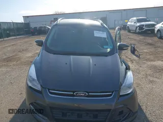 2015 Ford Escape Titanium with VIN 1FMCU9J90FUB58306, listed as a IAAI auction lot 41815151 with 136,835 mi miles. Bid and sale history available at carsss.com. Image 12.
