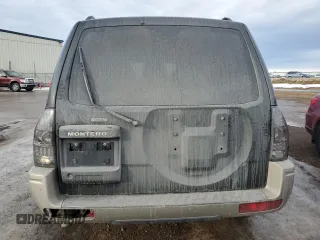 2003 Mitsubishi Montero z VIN JA4NW31SX3J600944, wystawiony jako Copart lot #87611305 z przebiegiem 215 693 mil mil oraz Czysty tytuł • Clean title. Historia ofert i sprzedaży dostępna na DreamBid. Obrazek 6.