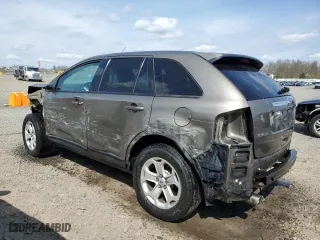 2012 Ford Edge SEL with VIN 2FMDK4JCXCBA86587, listed as a Copart auction lot 52224175 with 175,365 mi miles and Salvage Title. Bid and sale history available at carsss.com. Image 2.