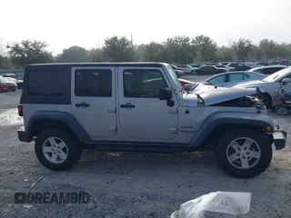 2014 Jeep Wrangler Unlimited Sport with VIN 1C4BJWDG8EL314792, listed as a IAAI auction lot 41489203 with 94,382 mi miles. Bid and sale history available at carsss.com. Image 14.