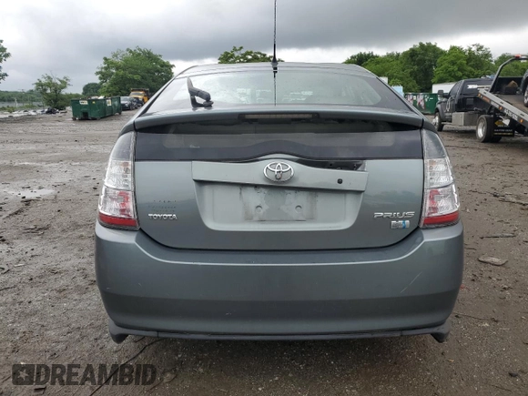 2005 Toyota Prius z VIN JTDKB20U253004140, wystawiony jako Copart lot #58275975 z przebiegiem 210 117 mil mil oraz Szkoda całkowita • Salvage title. Historia ofert i sprzedaży dostępna na DreamBid. Obrazek 6.
