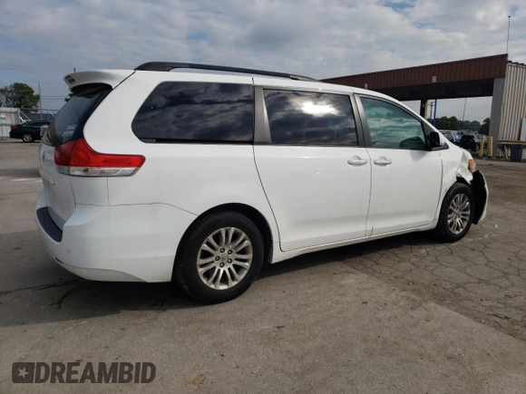 2012 Toyota Sienna XLE AAS with VIN 5TDYK3DC0CS250830, listed as a Copart auction lot 73323284 with 147,580 mi miles and Salvage Title. Bid and sale history available at DreamBid. Image 3.