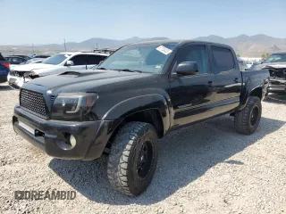 2011 Toyota Tacoma with VIN 5TFLU4EN7BX014761, listed as a Copart auction lot 57703435 with 196,411 mi miles and Salvage title. Bid and sale history available at DreamBid. Image 1.