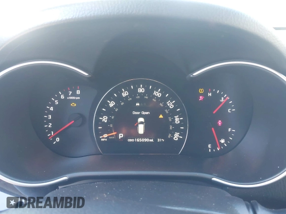 2015 Kia Sorento EX with VIN 5XYKU4A71FG590910, listed as a IAAI auction lot 41378588 with 165,090 mi miles. Bid and sale history available at carsss.com. Image 7.