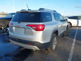 2017 GMC Acadia SLE with VIN 1GKKNLLS1HZ164054, listed as a IAAI auction lot 41542449 with 201,936 mi miles. Bid and sale history available at carsss.com. Image 4.