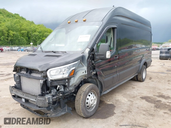 2022 Ford Transit Cargo z VIN 1FTBF4UG4NKA60882, wystawiony jako IAAI lot #42255992 z przebiegiem 2 977 mil mil oraz . Historia ofert i sprzedaży dostępna na DreamBid. Obrazek 19.