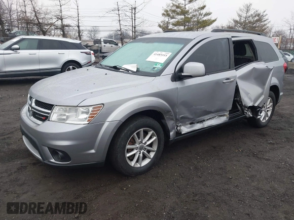 2016 Dodge Journey SXT with VIN 3C4PDDBG2GT242127, listed as a IAAI auction lot 41485555 with 119,728 mi miles. Bid and sale history available at carsss.com. Image 16.