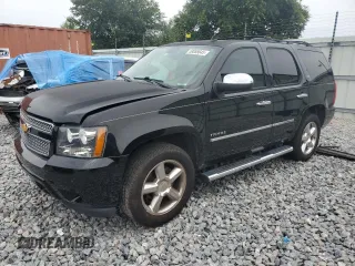 2014 Chevrolet Tahoe LTZ z VIN 1GNSCCE06ER209277, wystawiony jako Copart lot #58655645 z przebiegiem Nie podano mil oraz Czysty tytuł • Clean title. Historia ofert i sprzedaży dostępna na DreamBid. Obrazek 1.