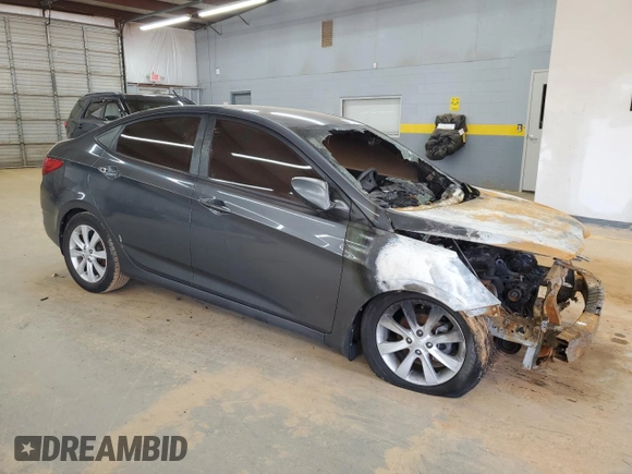 2012 Hyundai Accent GLS z VIN KMHCU4AE0CU225272, wystawiony jako Copart lot #49724155 z przebiegiem Nie podano mil oraz Szkoda całkowita • Salvage title. Historia ofert i sprzedaży dostępna na DreamBid. Obrazek 4.
