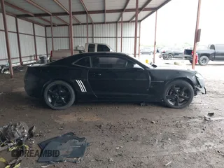 2013 Chevrolet Camaro LS z VIN 2G1FA1E31D9137775, wystawiony jako IAAI lot #42116988 z przebiegiem 298 764 mil mil oraz . Historia ofert i sprzedaży dostępna na DreamBid. Obrazek 13.