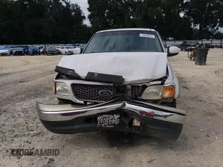 1999 Ford F-150 z VIN 1FTRX07W6XKA48100, wystawiony jako Copart lot #73209844 z przebiegiem Nie podano mil oraz Szkoda całkowita • Salvage title. Historia ofert i sprzedaży dostępna na DreamBid. Obrazek 11.