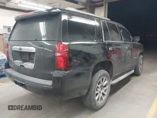 2015 Chevrolet Tahoe LT z VIN 1GNSCBKC1FR228488, wystawiony jako IAAI lot #41933869 z przebiegiem 164 523 mil mil oraz . Historia ofert i sprzedaży dostępna na DreamBid. Obrazek 4.