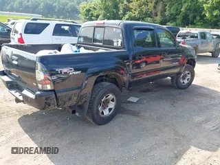 2011 Toyota Tacoma with VIN 3TMLU4EN4BM079699, listed as a IAAI auction lot 42446694 with 200,103 mi miles and . Bid and sale history available at DreamBid. Image 4.