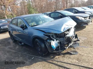 2015 Mazda 3 i SV with VIN JM1BM1T78F1271497, listed as a IAAI auction lot 40878398 with 127,617 mi miles. Bid and sale history available at carsss.com. Image 1.