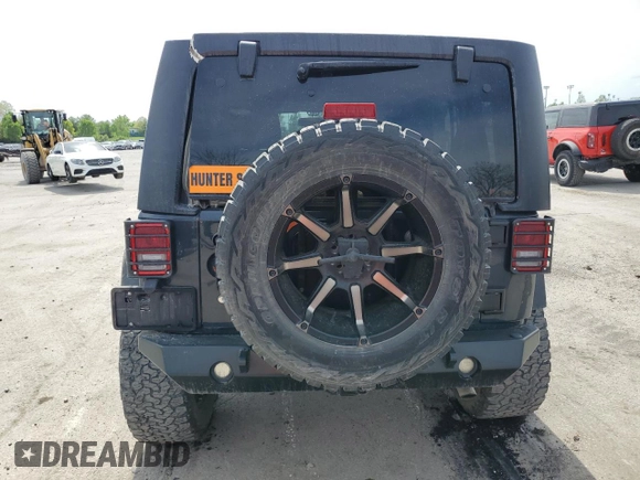 2016 Jeep Wrangler Unlimited Sport with VIN 1C4BJWDG7GL292531, listed as a Copart auction lot 54062075 with 110,878 mi miles and Salvage Title. Bid and sale history available at DreamBid. Image 6.