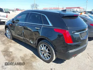 2017 Cadillac XT5 Premium Luxury FWD z VIN 1GYKNCRS8HZ127001, wystawiony jako IAAI lot #41698197 z przebiegiem 120 978 mil mil oraz . Historia ofert i sprzedaży dostępna na DreamBid. Obrazek 3.