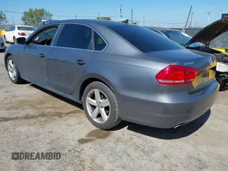 2013 Volkswagen Passat SE w/Sunroof & Nav with VIN 1VWBP7A35DC148149, listed as a IAAI auction lot 42148096 with 228,555 mi miles. Bid and sale history available at carsss.com. Image 3.