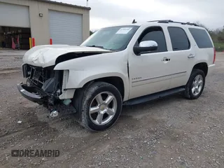 2014 Chevrolet Tahoe LTZ z VIN 1GNSCCE05ER101331, wystawiony jako IAAI lot #41793150 z przebiegiem 177 769 mil mil oraz . Historia ofert i sprzedaży dostępna na DreamBid. Obrazek 17.