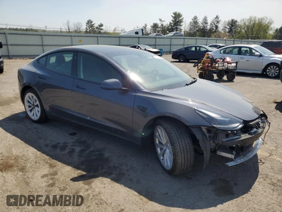 2023 Tesla Model 3 Long Range with VIN 5YJ3E1EB2PF389041, listed as a Copart auction lot 53450725 with 27,060 mi miles and Salvage Title. Bid and sale history available at DreamBid. Image 4.