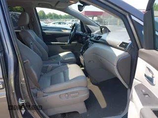 2014 Honda Odyssey EX-L with VIN 5FNRL5H63EB073585, listed as a IAAI auction lot 42673004 with 119,971 mi miles and . Bid and sale history available at DreamBid. Image 5.