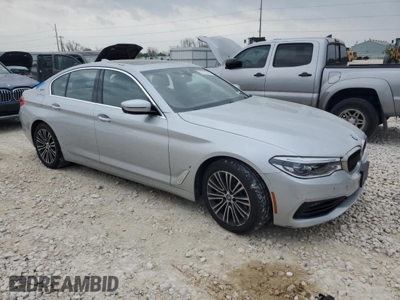 2018 BMW 5 Series 530e xDrive with VIN WBAJB1C58JB084292, listed as a Copart auction lot 51213575 with 105,277 mi miles and Clean title. Bid and sale history available at DreamBid. Image 4.