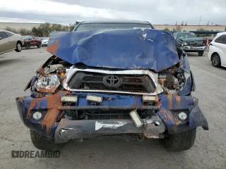 2014 Toyota Tacoma with VIN 5TFLU4EN7EX106909, listed as a Copart auction lot 46906235 with 102,681 mi miles and Salvage Title. Bid and sale history available at DreamBid. Image 5.