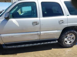 2004 Chevrolet Tahoe LT with VIN 1GNEC13Z94R203331, listed as a IAAI auction lot 41799844 with 266,669 mi miles. Bid and sale history available at carsss.com. Image 6.