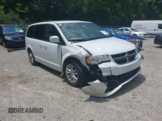 2018 Dodge Grand Caravan SXT z VIN 2C4RDGCG0JR209467, wystawiony jako IAAI lot #42593496 z przebiegiem 182 159 mil mil oraz . Historia ofert i sprzedaży dostępna na DreamBid. Obrazek 1.