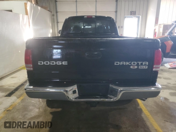 2004 Dodge Dakota SLT with VIN 1D7HG42N54S675034, listed as a Copart auction lot 85963344 with 97,478 mi miles and Salvage Title. Bid and sale history available at carsss.com. Image 6.