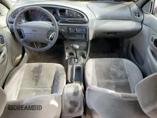 1999 Ford Contour SE с VIN 1FAFP6633XK158685, выставлен на аукционе Copart как лот 46701805 с пробегом 407 846 миль миль и Списание • Salvage title. История ставок и продаж доступна на DreamBid. Изображение 8.
