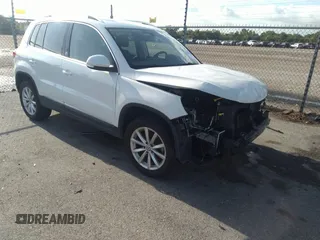 2017 Volkswagen Tiguan Wolfsburg Edition with VIN WVGRV7AXXHW509109, listed as a IAAI auction lot 42477386 with 77,645 mi miles and . Bid and sale history available at DreamBid. Image 1.