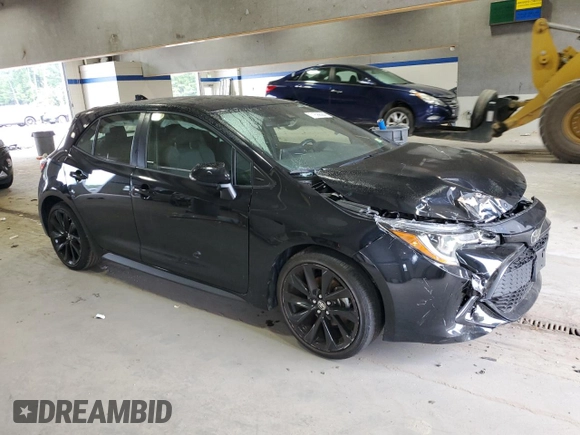 2021 Toyota Corolla Hatchback SE with VIN JTND4MBE9M3135094, listed as a Copart auction lot 71599094 with 51,063 mi miles and Salvage Title. Bid and sale history available at carsss.com. Image 4.