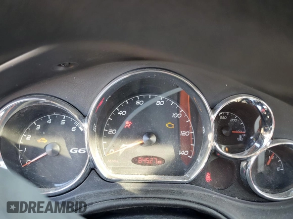 2005 Pontiac G6 with VIN 1G2ZG528054173847, listed as a Copart auction lot 77558494 with 84,527 mi miles and Salvage Title. Bid and sale history available at carsss.com. Image 9.