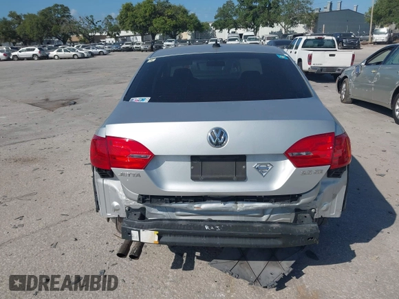 2012 Volkswagen Jetta SE z VIN 3VWDP7AJ9CM313060, wystawiony jako IAAI lot #42182183 z przebiegiem 123 291 mil mil oraz . Historia ofert i sprzedaży dostępna na DreamBid. Obrazek 6.
