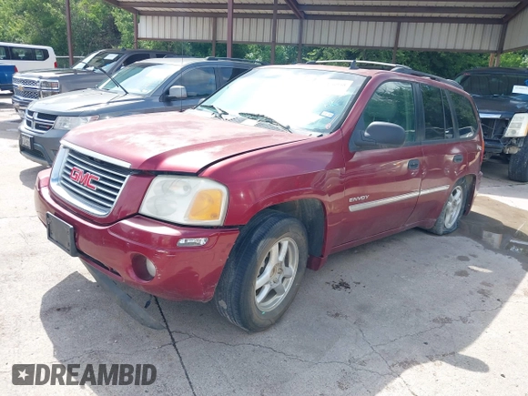 2006 GMC Envoy SLE z VIN 1GKDS13S362314323, wystawiony jako IAAI lot #42476958 z przebiegiem 164 322 mil mil oraz . Historia ofert i sprzedaży dostępna na DreamBid. Obrazek 2.