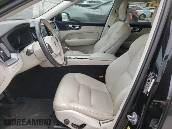 2018 Volvo XC60 Momentum with VIN LYV102RK1JB073418, listed as a Copart auction lot 73763614 with 64,692 mi miles and Salvage Title. Bid and sale history available at DreamBid. Image 7.