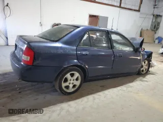 2000 Mazda Protege ES with VIN JM1BJ221XY0211385, listed as a Copart auction lot 48225605 with Not Provided miles and Non Repairable. Bid and sale history available at DreamBid. Image 3.