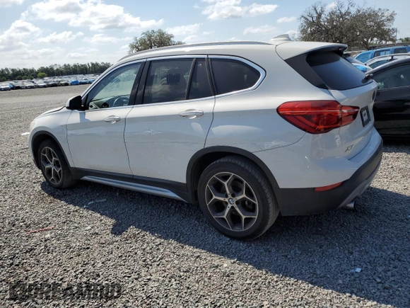 2018 BMW X1 sDrive28i with VIN WBXHU7C32J5L07666, listed as a Copart auction lot 54173465 with 132,514 mi miles and Clean Title. Bid and sale history available at DreamBid. Image 2.
