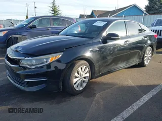 2016 Kia Optima EX with VIN 5XXGU4L37GG119415, listed as a IAAI auction lot 41242191 with 92,657 mi miles. Bid and sale history available at carsss.com. Image 2.