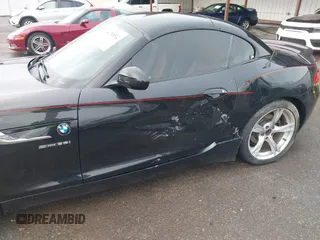 2016 BMW Z4 sDrive35i with VIN WBALM7C5XGJ799319, listed as a IAAI auction lot 41786542 with 73,906 mi miles. Bid and sale history available at carsss.com. Image 6.
