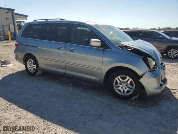 2007 Honda Odyssey EX-L with VIN 5FNRL38687B110282, listed as a Copart auction lot 48510625 with 203,861 mi miles and Salvage Title. Bid and sale history available at carsss.com. Image 4.