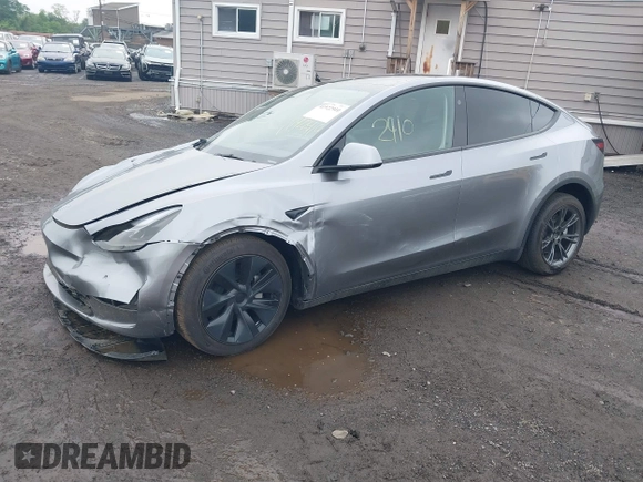 2024 Tesla Model Y Long Range z VIN 7SAYGDEE7RA300756, wystawiony jako IAAI lot #41922910 z przebiegiem 4 262 mil mil oraz . Historia ofert i sprzedaży dostępna na DreamBid. Obrazek 2.