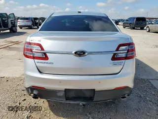 2013 Ford Taurus Limited with VIN 1FAHP2F84DG129904, listed as a Copart auction lot 58218205 with 105,877 mi miles and Salvage title. Bid and sale history available at DreamBid. Image 6.