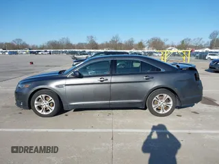 2016 Ford Taurus SEL with VIN 1FAHP2E88GG157761, listed as a IAAI auction lot 41937397 with 129,142 mi miles and . Bid and sale history available at DreamBid. Image 14.