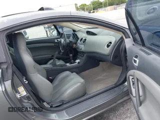 2006 Mitsubishi Eclipse GT with VIN 4A3AK34T86E048617, listed as a IAAI auction lot 42166851 with 128,716 mi miles. Bid and sale history available at carsss.com. Image 5.