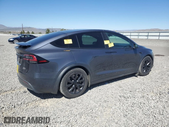 2023 Tesla Model X with VIN 7SAXCAE52PF380229, listed as a Copart auction lot 53535065 with 42,456 mi miles and Salvage Title. Bid and sale history available at DreamBid. Image 3.