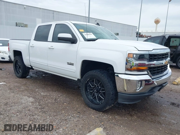2018 Chevrolet Silverado 1500 LT with VIN 3GCPCREC7JG402401, listed as a IAAI auction lot 41880462 with 128,995 mi miles and . Bid and sale history available at DreamBid. Image 1.